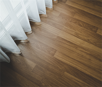Hardwood vs. Luxury Vinyl Plank: The Ultimate Main-Level Flooring Showdown